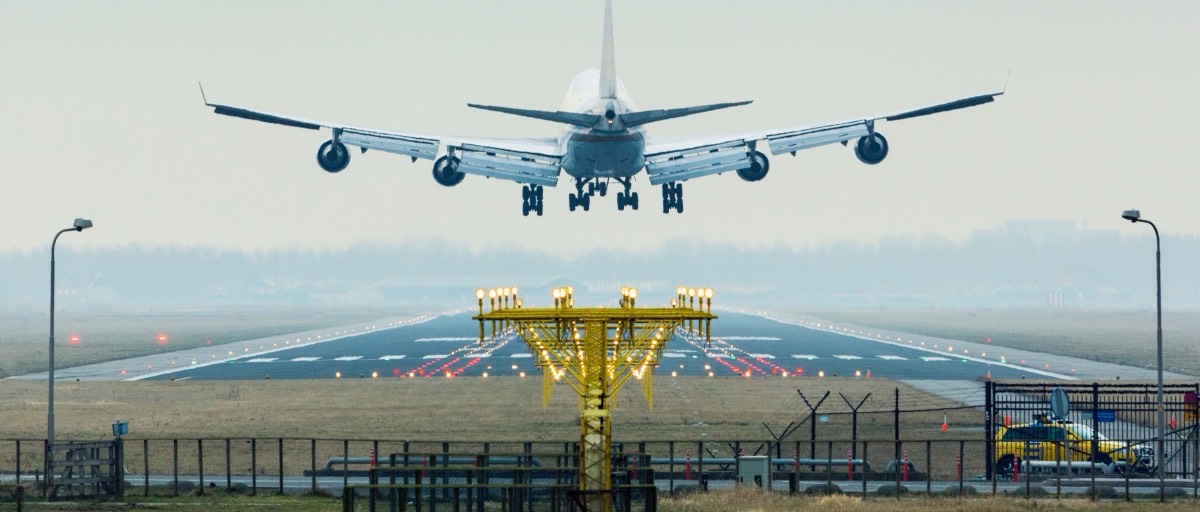 Wide bodied aircraft over the threshold on final approach